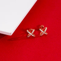 CZ Four-Pointed Star Earrings - 18k Gold Filled